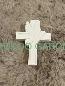 Odlitek kříž s holubicí